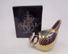 A boxed Royal Crown Derby paperweight with stopper modelled as a blue tit