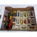 A box containing boxed and unboxed die cast vehicles to include Ledo Days Gone By,