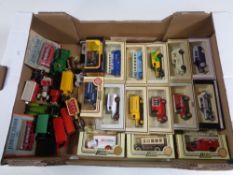 A box containing boxed and unboxed die cast vehicles to include Ledo Days Gone By,