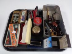 A tray of pipes, table lighters, Calibri and Mintral cased lighters,