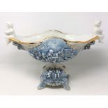 A Capodimonte china comport embossed with cherub decoration