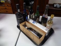 A tray containing eight bottles of alcohol to include Tawny Port in wooden case,