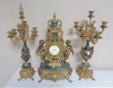 An impressive marble and brass Imperial three piece clock garniture