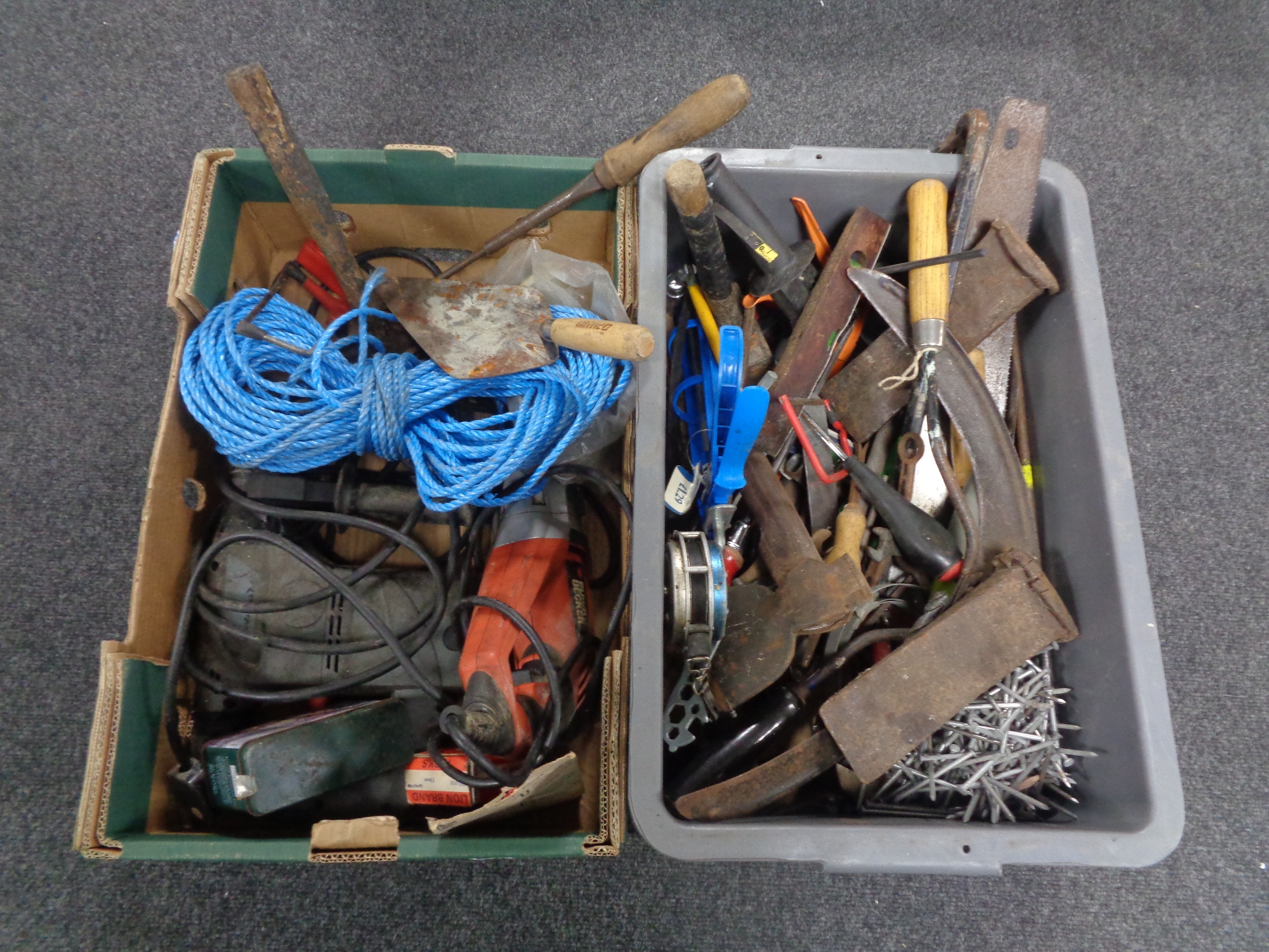 A box and a crate containing a large quantity of assorted hand tools, power tools, bungee cords,