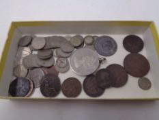 A box of 17th to 19th century British coins to include six pence pieces, 1799 penny,