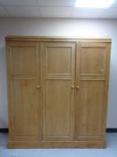 An antique striped pine double door wardrobe, 179 x 52 x 202 cm.