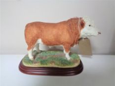 A Border Fine Arts figure, Cattle County Show, Simmental Bull, No. A0741, with original box.