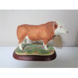 A Border Fine Arts figure, Cattle County Show, Simmental Bull, No. A0741, with original box.