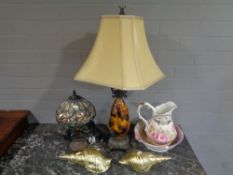 A Tiffany style table lamp with leaded glass shade,