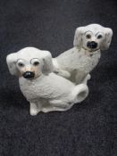 A pair of Staffordshire spaniels with glass eyes