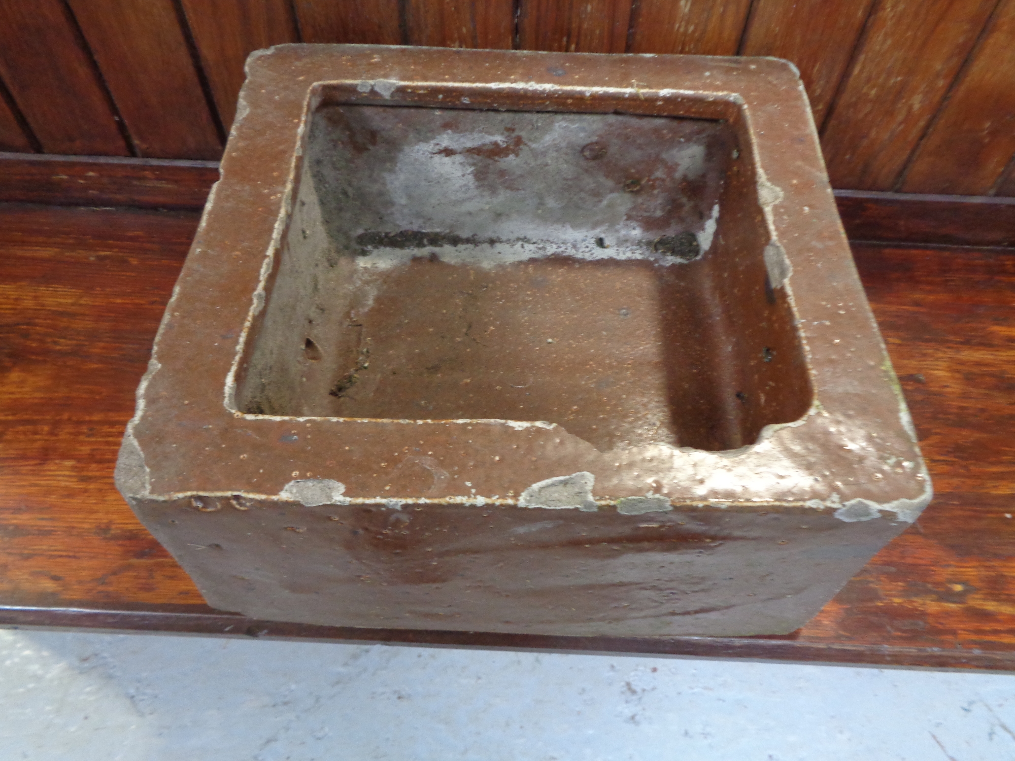 An antique square salt glazed trough, width 35.