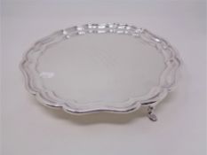 A 1930's Birmingham silver card tray on raised feet CONDITION REPORT: 722g