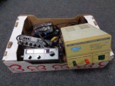 A box containing an Eagle regulated power supply, Harrier CB radio, Marshall micro amp.