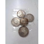 Four Victorian silver Crowns together with an 1890 Victorian silver florin.