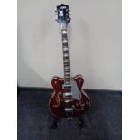 A Gretsch Electromatic G5422T semi-acoustic guitar, red, maple body and neck, rosewood fretboard,