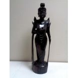 A carved Eastern hardwood figure.