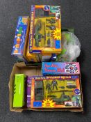 Two boxes containing assorted toys to include remote controlled cars,