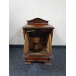 An Edwardian mahogany coal receiver.