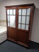 A 19th century mahogany double door hanging wardrobe with glass panel doors (a/f)