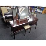 A Stag Minstrel dressing table with triple mirror and stool