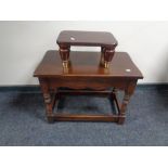 A Bevan Funnell oak occasional table together with a footstool on brass feet