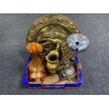 A box containing metal wares to include smoker's stand, brass embossed wall plaques, brass jug,