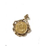 A Victorian gold sovereign 1887 mounted in 9ct gold, 12.7g gross.