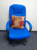 A high backed swivel office armchair upholstered in a blue fabric