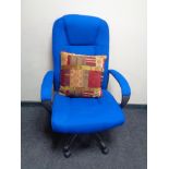 A high backed swivel office armchair upholstered in a blue fabric
