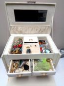 A large box of costume jewellery, sterling silver pendants, white metal bracelets etc.