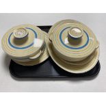 A tray of five pieces of Clarice Cliff Newport pottery dinner ware to include two lidded tureens,