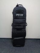 A Ping airplane golf bag flight case.