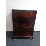 A Stag Minstrel seven drawer chest