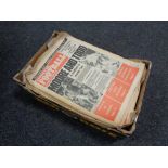 A box containing 1970s Inside Football newspapers.