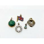 A yellow gold Union Jack enamel charm together with other yellow gold pendants including opal and