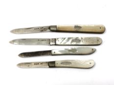 Four antique silver and mother of pearl fruit knives