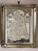 A colour map of Northumberland in decorative frame.