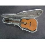 A Lyon by Washburn model LD7-M acoustic guitar, in hard case.