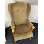 A 20th century wingback armchair