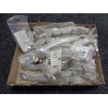 A box containing miscellaneous kitchen cabinet door handles (new).