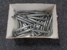 A box containing 27 pewter kitchen cabinet door handles (new).