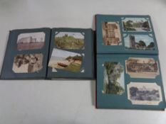 Two albums of early 20th century colour and black and white postcards to include Manchester,