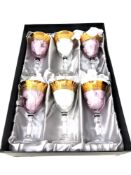 A boxed set of Rockingham crystal glasses with 24ct gold rims