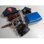 A tray containing Yashica and Agfa cameras, camera tripod.