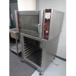 A Cuisine De France stainless steel commercial oven, width 98 cm, on trolley.