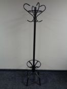 A contemporary metal hat and coat stand together with a painted linen box