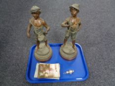 A tray containing a pair of antique Spelter figures on wooden stands,