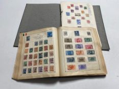 A Strand stamp album and on other containing a quantity of 20th century stamps of the world