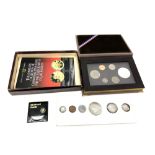 A collection of various silver coins and coin sets