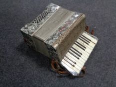 A 20th century Alvari piano accordion.